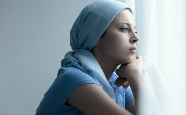 Cancer survivor in a scarf