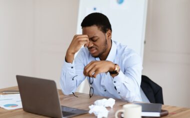 Exhausted african american manager suffering from burnout